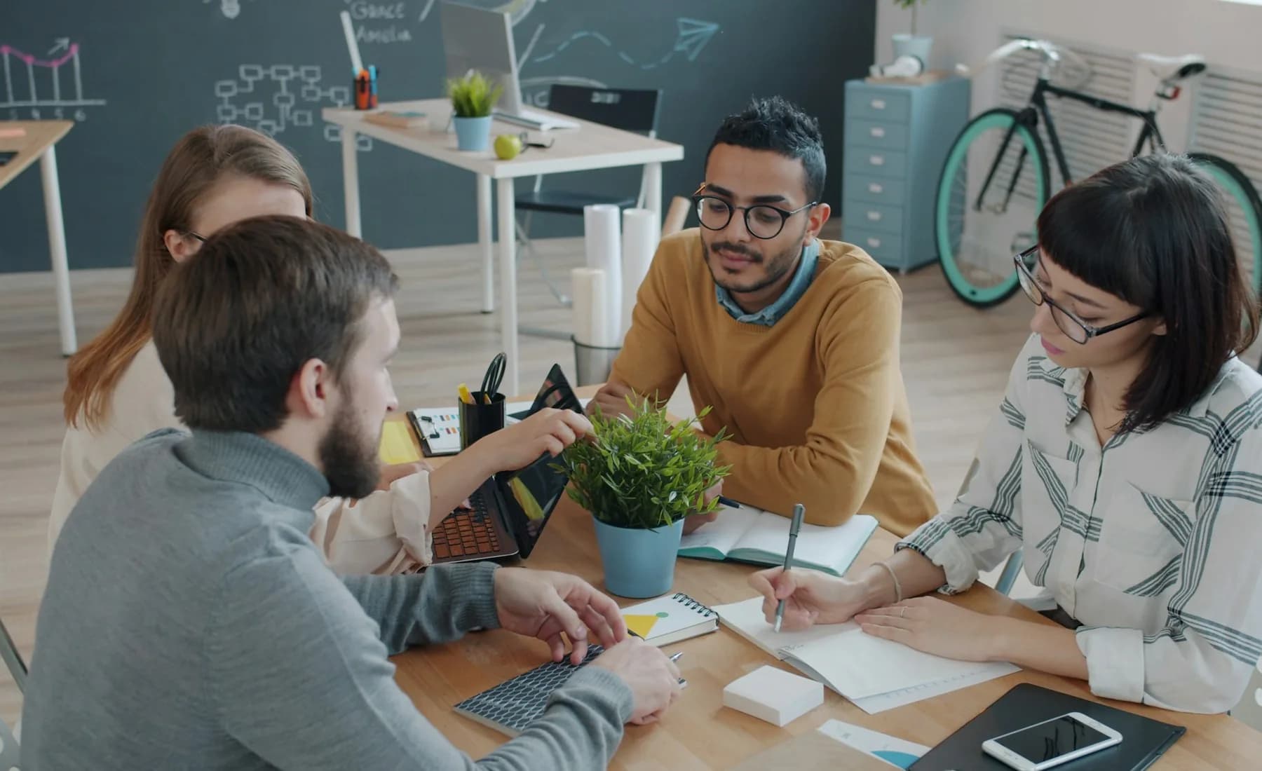 A project team reviewing a delivery plan together